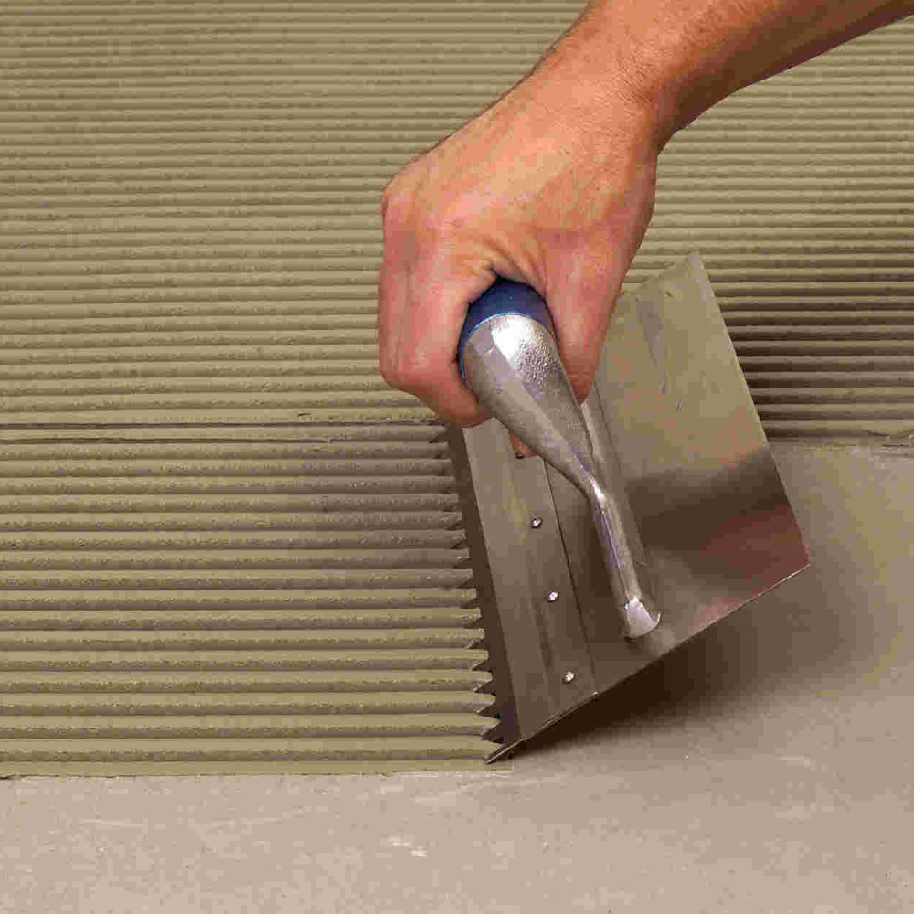 tegellijm gebruiken lijmkam